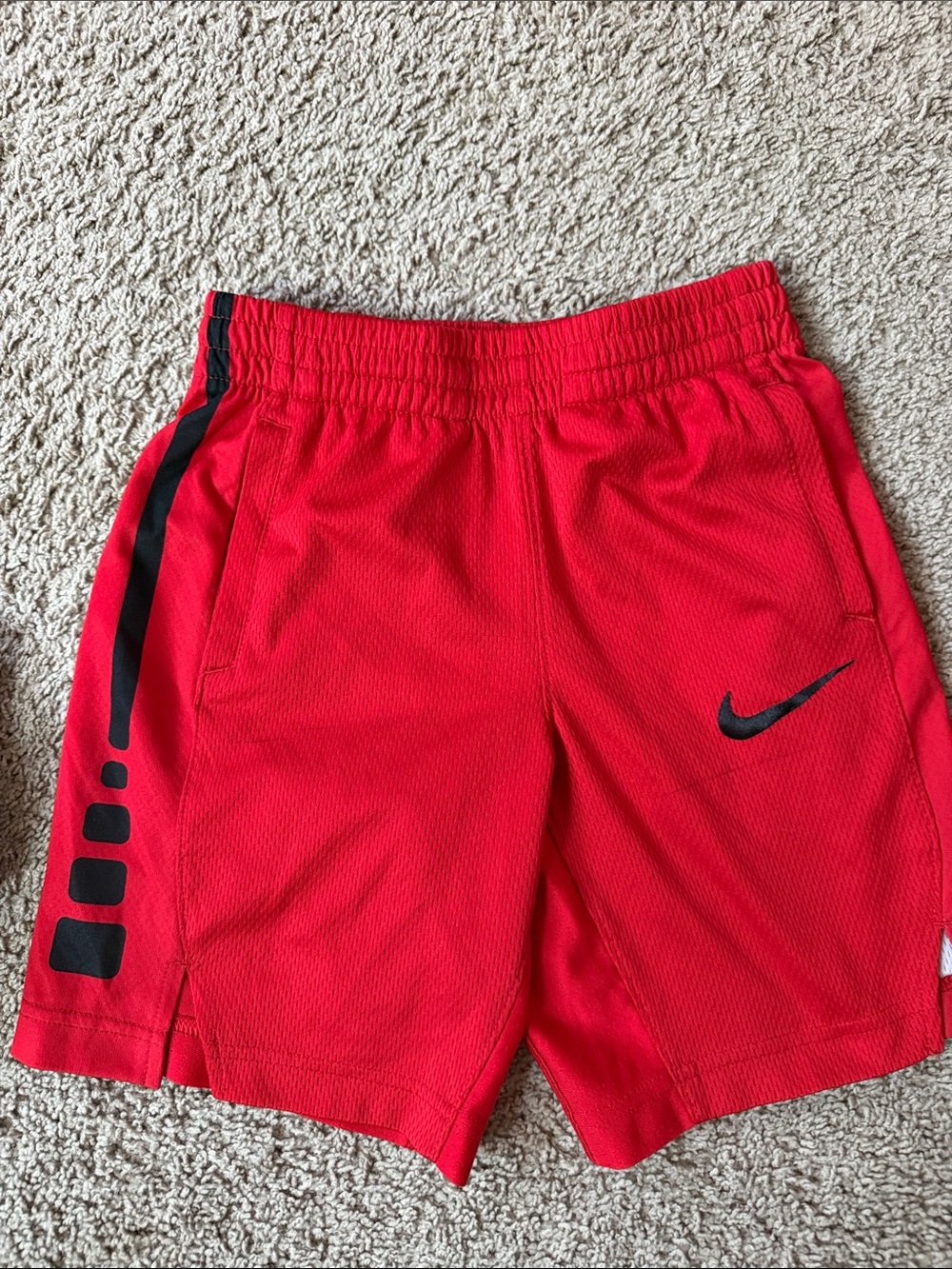 Nike Red Shorts with Black Swoosh and Side Accents